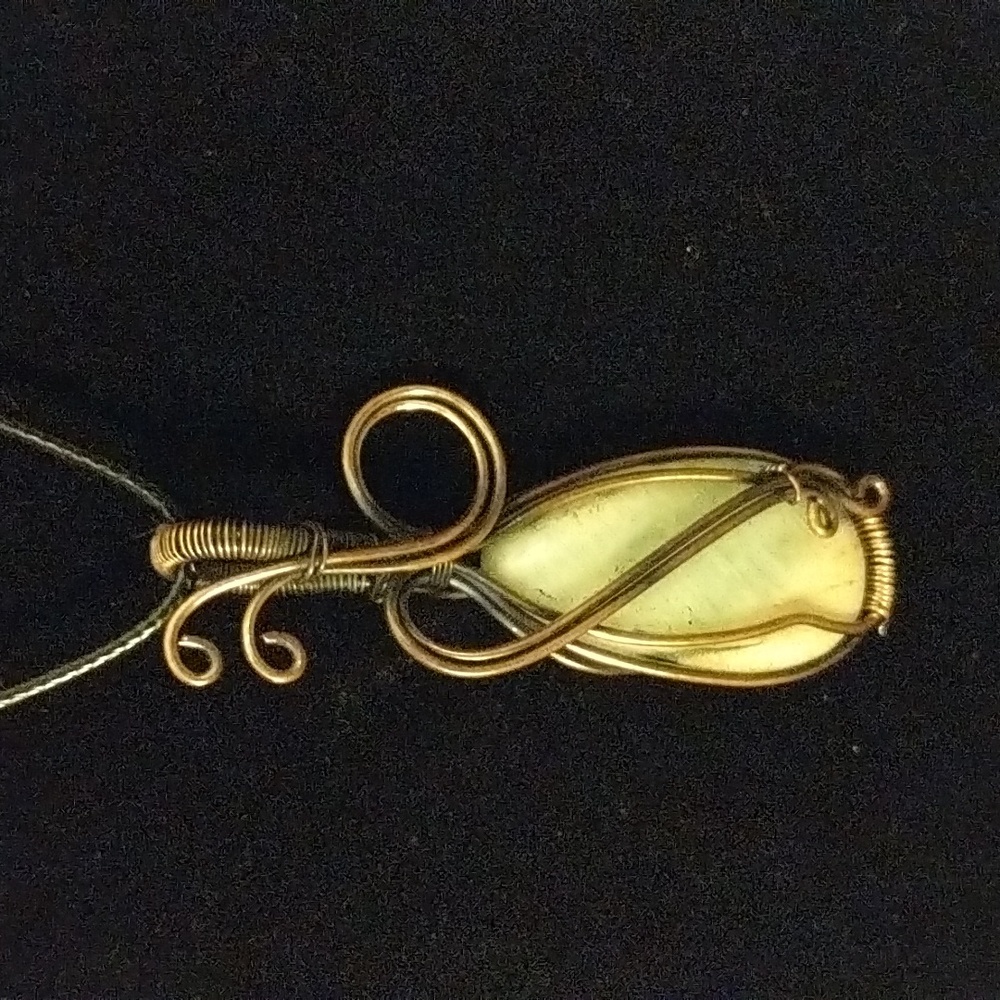 Wire wrap pendant necklace.